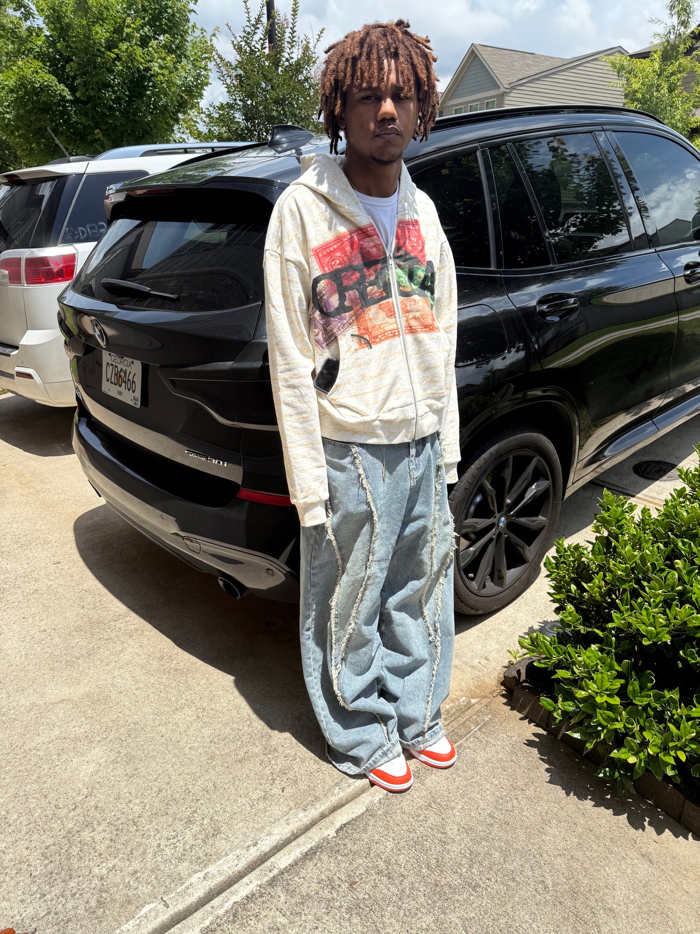 THE PURCHASE ZIP-UP
